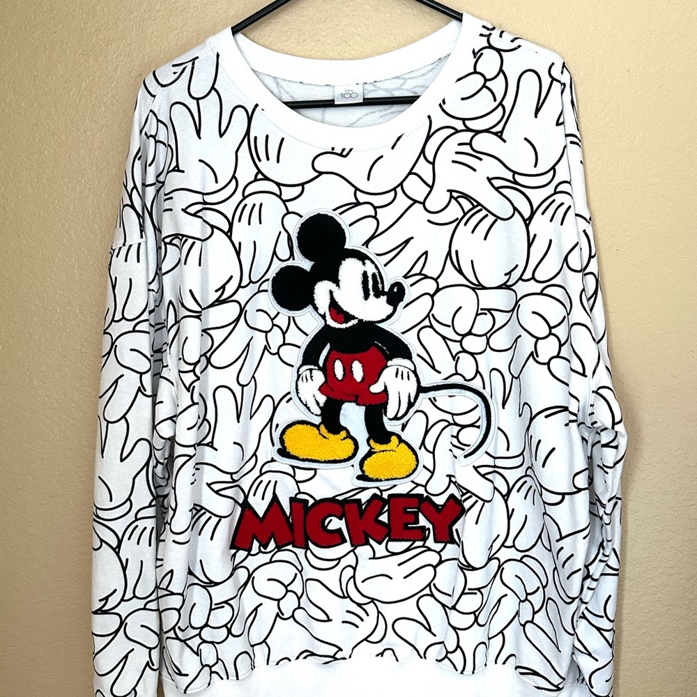 Disney White and Black 100 year sweatshirt.